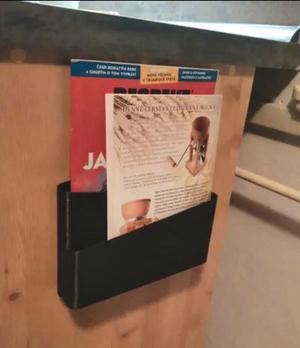 Newspaper and magazine wall holder