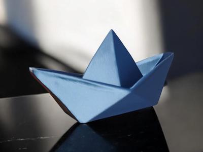Fragility in Solid Form: Origami Boat Reinvented