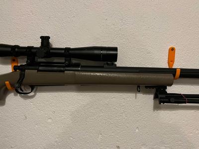 Airsoft gun mounts on the wall