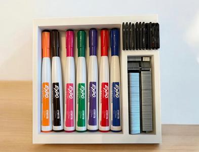 Organizer for SD Cards, Expo Markers, and Staples.