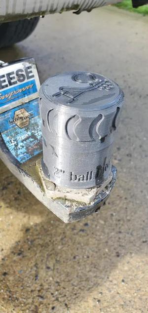Trailer ball hitch cover.   