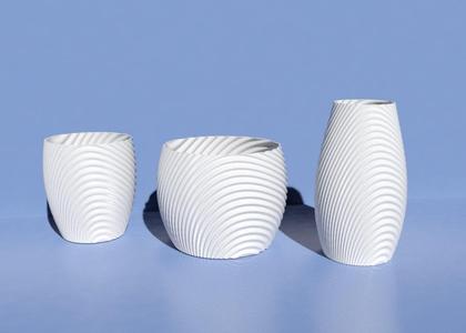 Wavy organic bowl, cups, vase and flower pot.