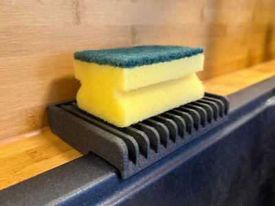 Sponge holder for kitchen sink with rim