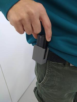 Battery holder for belt
