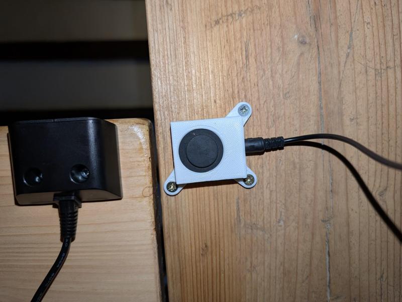 KVM switch button mount