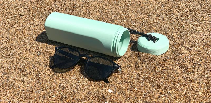 Glasses case with bottle opener