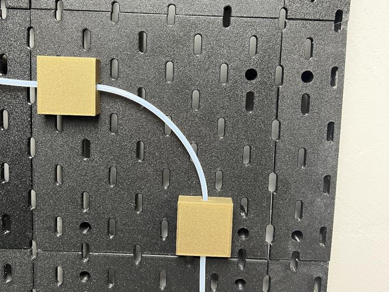 Hose and cable guide