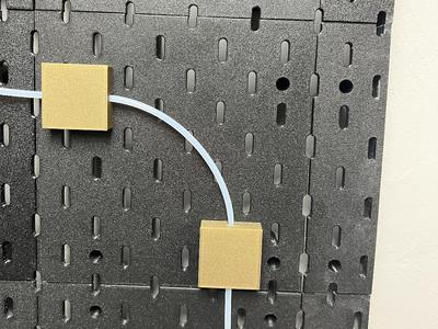 Hose and cable guide