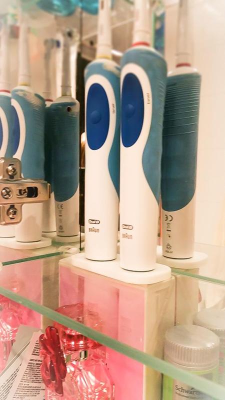 Electric toothbrush holder. Oral-B