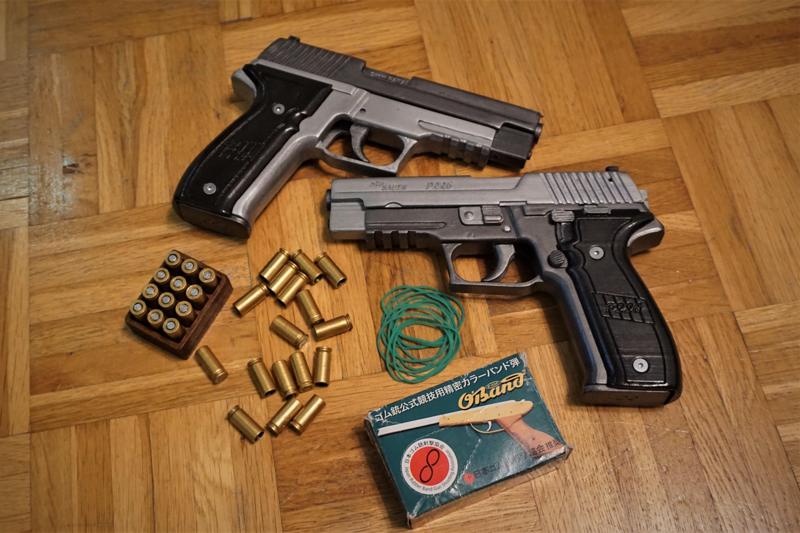 Blowback and shell ejecting rubber band gun (Sig Sauer P226)