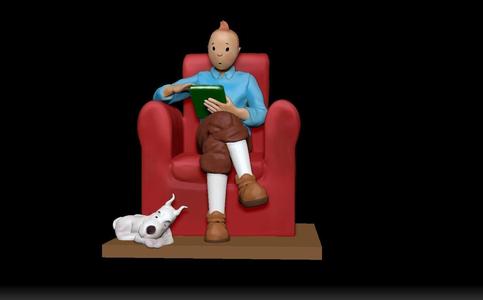 TinTin sitting on the red sofa