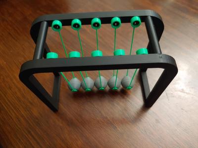 Decorative Newton's Cradle (2/13/2024: Read Notes)