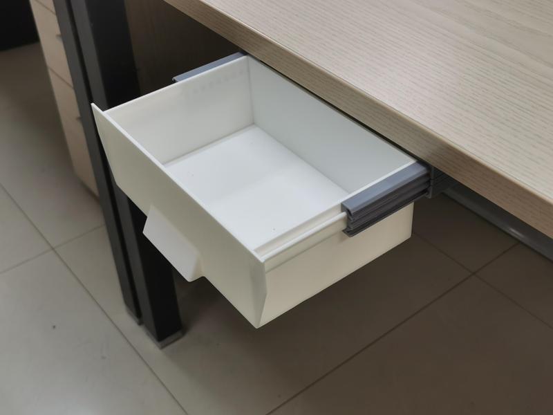 Fully-openable under desk drawer Fully-openable under desk drawer