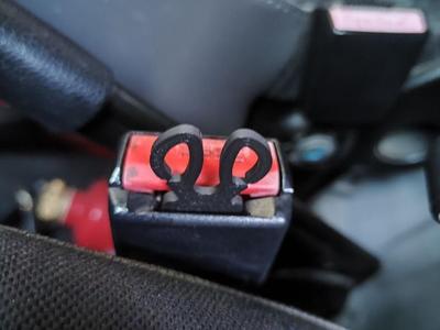 Seatbelt Silencer and Shopping Cart Token