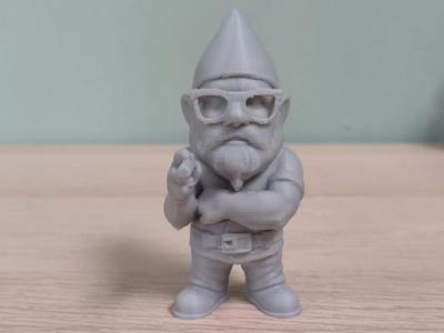 Badass Gnome with sunglasses and sigar.