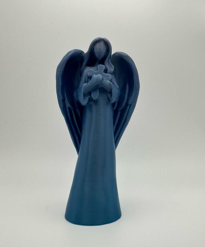 Angel holding cross