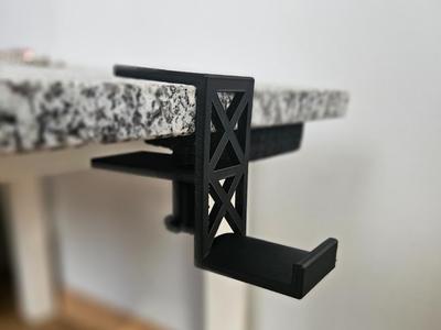 Desk headphones holder with a screw