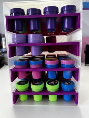 Self inking stamp storage tower