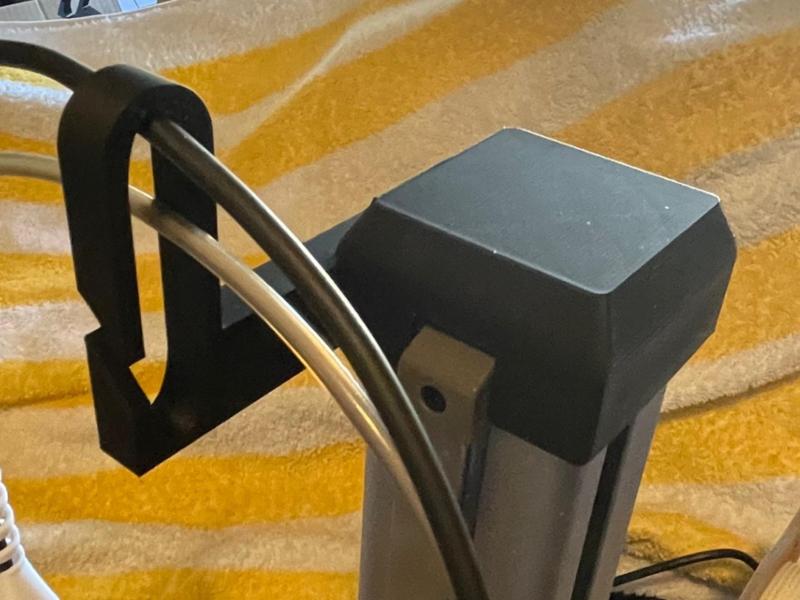 A1mini Cable Guide simply attach to original cap