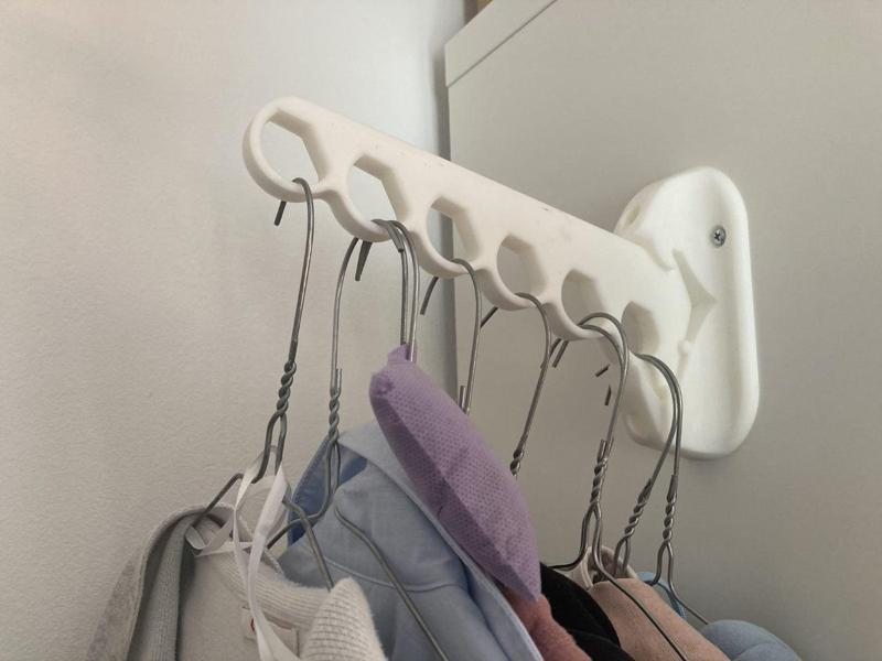 Coat hangers holder