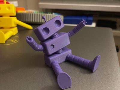 Cute baby robot (doubles as a phone stand)