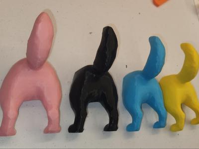 Dog tail wall hook