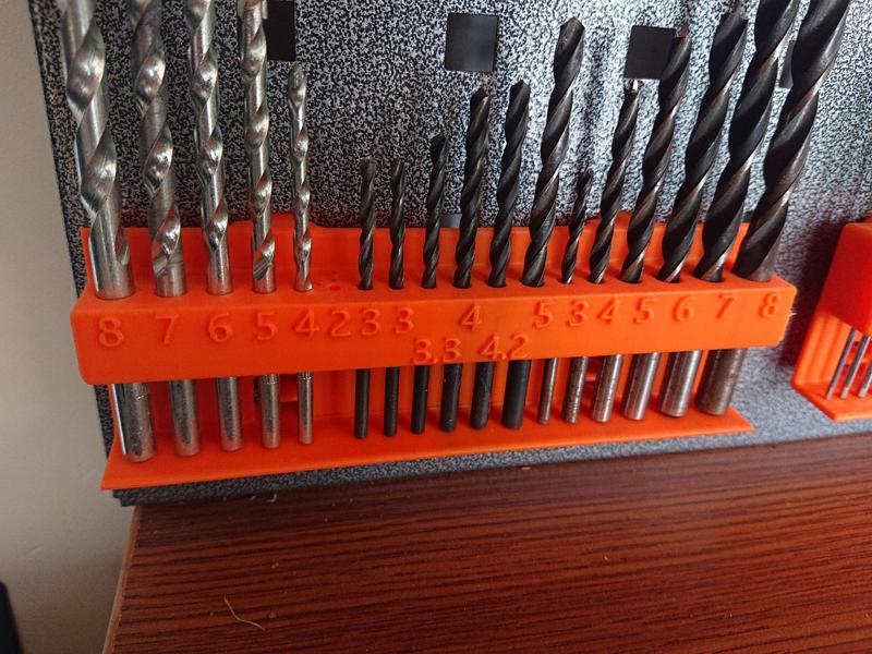 Pegboard, drill bit holder