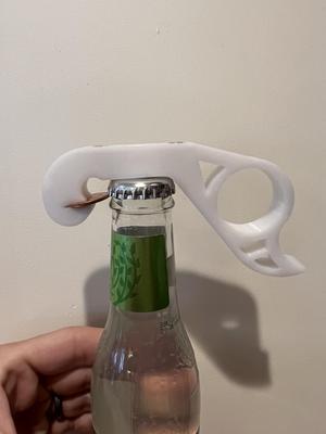 The Penny Popper: A one handed magnetic bottle opener for your fridge