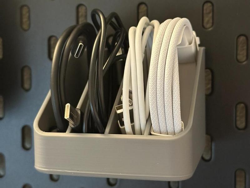 Cable storage for IKEA Skadis Pegboard