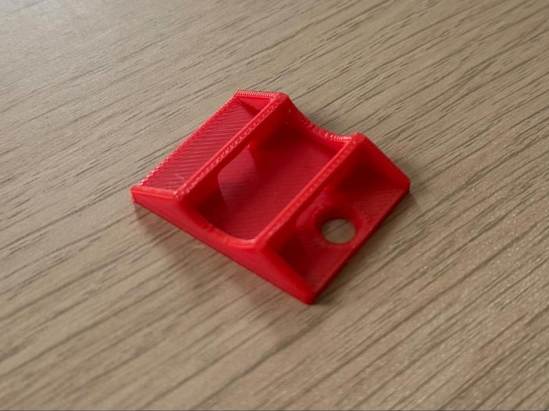 Zip tie cable holder side hole