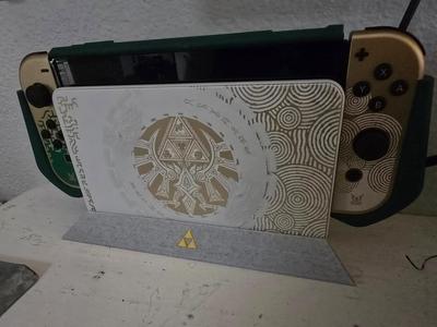 Nintendo Switch dock stand with Triforce
