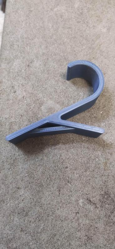 Reinforced radiator towel hook