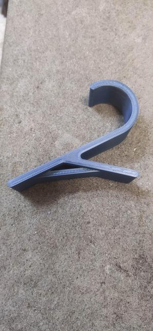 Reinforced radiator towel hook
