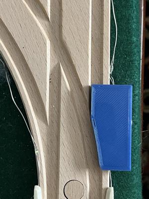 Diverter for wooden train track switches