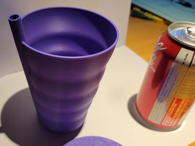 Cup with built in straw and lid