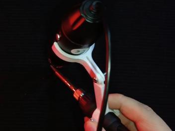 Microscope mounting bracket for soldering iron