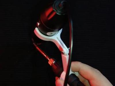 Microscope mounting bracket for soldering iron