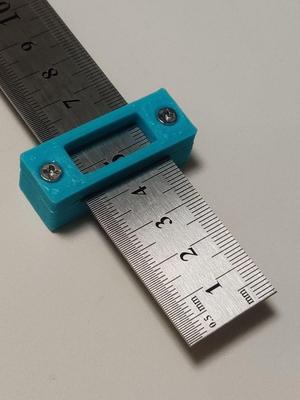 Block for fixing ruler scale (定規の目盛を固定するためのブロック)