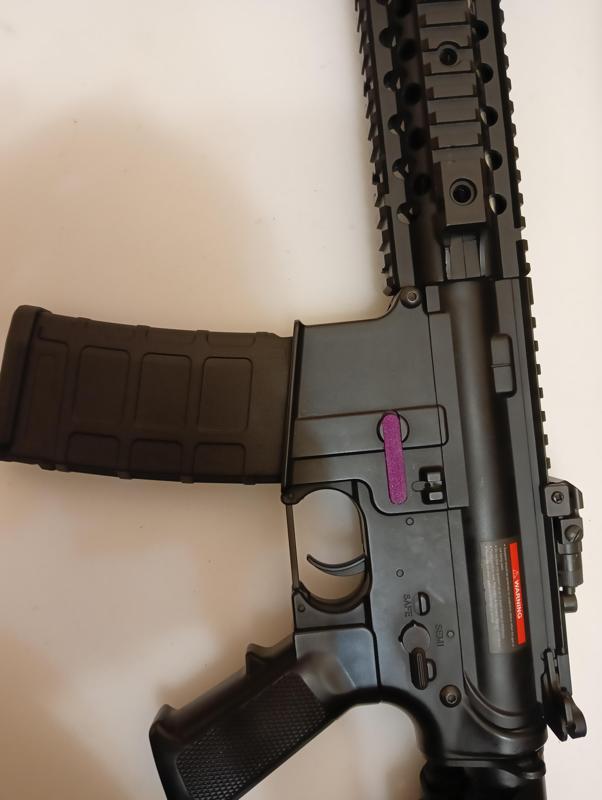 Airsoft M4 mag release button