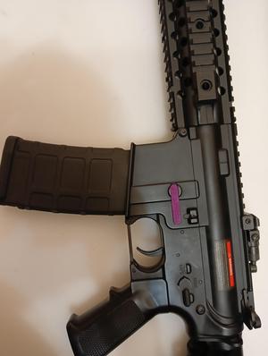 Airsoft M4 mag release button