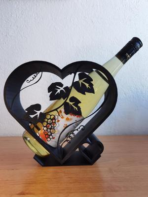 Heart shaped wine bottle holder.