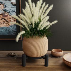 Self-watering flower pot and planter
