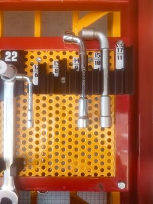 Metric L-spanner holder for perforated metal sheets