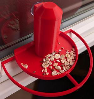 Tiny window mountable bird feeder