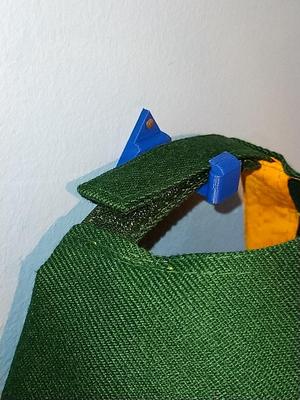 Cap wall hanger