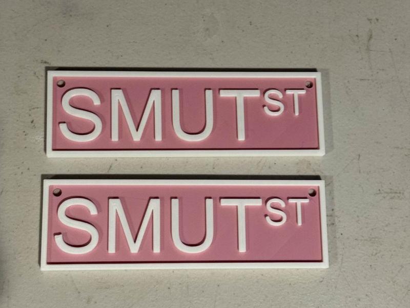 Smut street sign