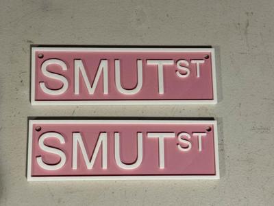 Smut street sign