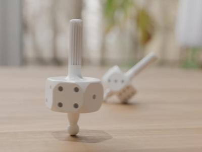 SpinDice – A Spinning Dice Top with a Twist
