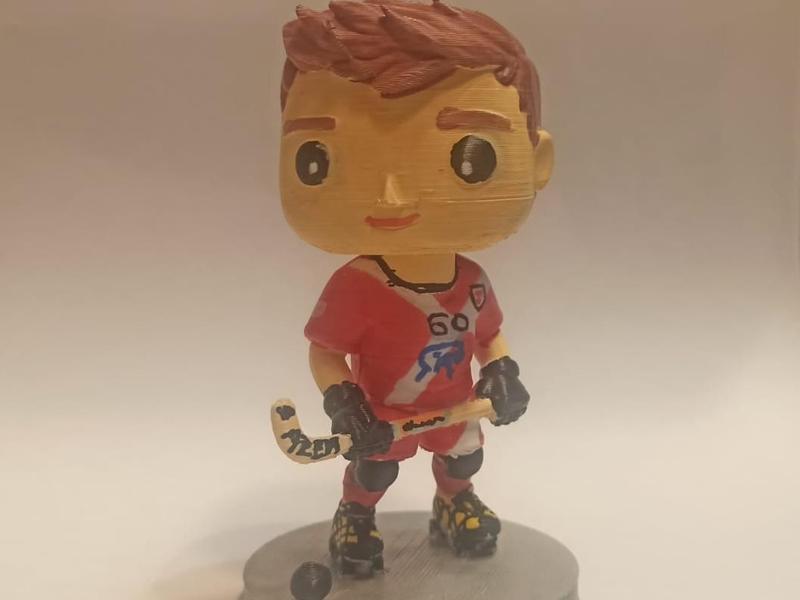 Big-headed roller hockey player
