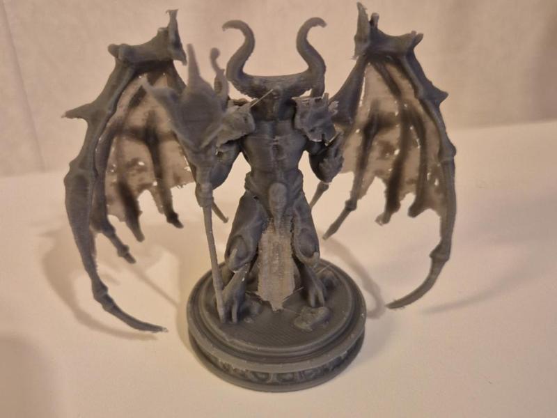 Demon with staff